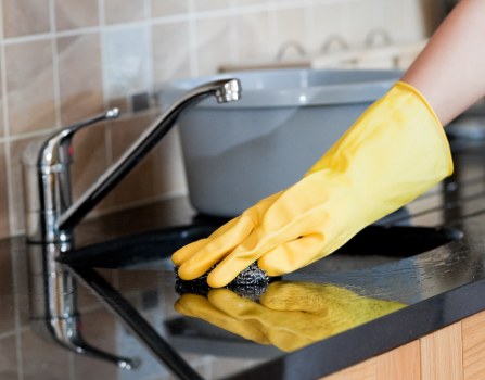 Oven cleaner in Pimlico removing grease from oven racks and trays