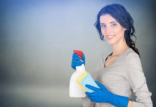 Carpet cleaning technician treating stains in a Pimlico property